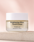 Brightening Glow Facial Cream ambalajı açık fon önünde ürün çekimi